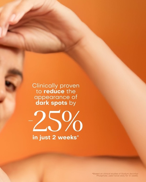 This static creative showcases a clean, minimalist visual style featuring a focus on scientific claims for skin brightening and spot reduction.